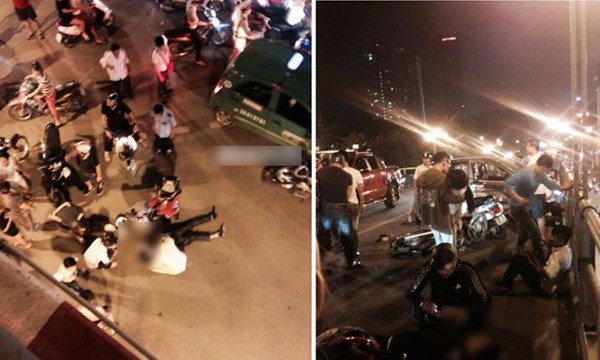 Hiện trường vụ tai nạn trên cầu vượt Thái Hà – Chùa Bộc. Ít nhất 7 xe máy bị hư hỏng nặng.