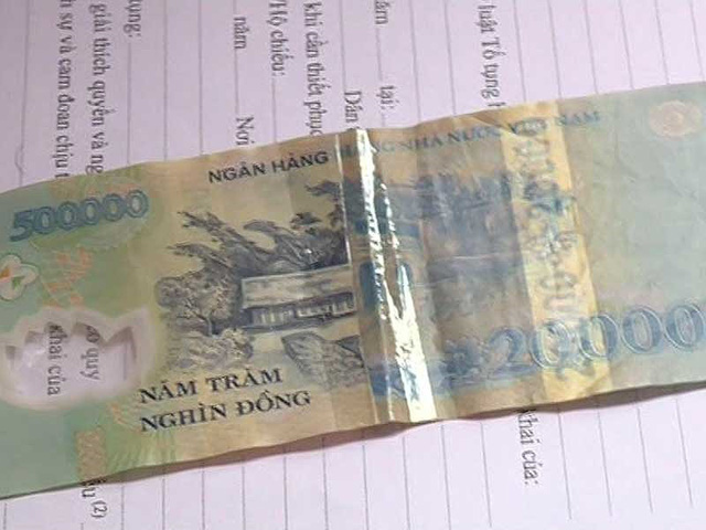 CHÚ Ý: Cảnh giác chiêu biến tờ 20.000 đồng thành 500.000 đồng