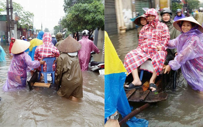 Mưa ngập, mẹ ngồi xe bò lội nước đi... đẻ ở Hà Nội