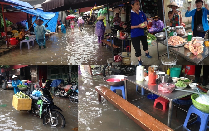 Mưa lớn kéo dài 1 giờ: Chợ cóc vắng hoe, tiểu thương khốn đốn kê cao kệ hàng để rau quả không ngập trong nước