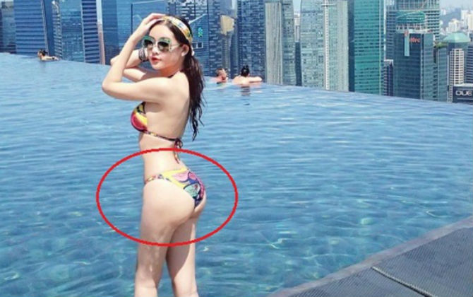 Diện bikini nóng bỏng là thế, Hoa hậu Đại dương Ngân Anh lộ vòng 3 biến dạng, vai u thịt bắp