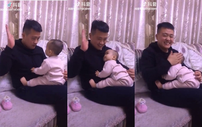 Thấy bố dơ tay dọa đánh, cậu bé làm một hành động khiến bố tan chảy chỉ biết ôm con cười hạnh phúc