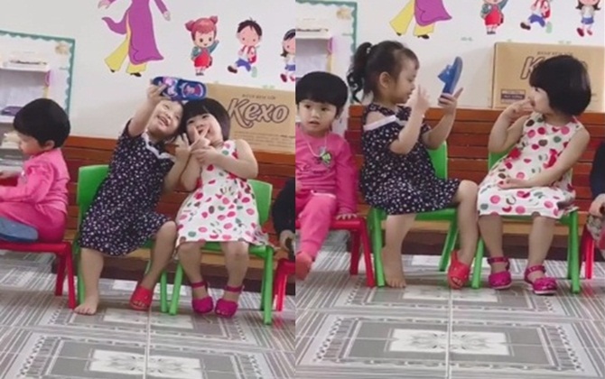 Cười ngất với clip 2 cô bé đáng yêu cầm dép "selfie" vì tưởng tượng thành smartphone