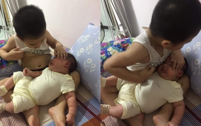 'Cười rụng rốn' với màn anh trai vén áo cho em bú cực đáng yêu