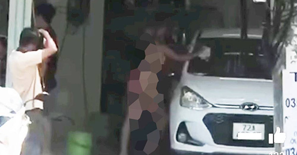 Cô gái mặc bikini chụp ảnh tại tiệm rửa xe gây phản cảm

